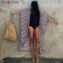 Charger l'image dans la galerie, Kimono Bohème Impressions Feuilles Pour Femmes, Kimono Bohème léger et stylé, parfait pour ajouter une touche naturelle à vos tenues d'été.